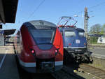 In W-Oberbarmen kann man häufiger diese Kombination nebeneinander sehen: S8 (1440 313 hinten) wartet auf Gleis 5 auf Fahrgäste Richtung Düsseldorf, daneben RB48 (geschoben von 110 469)