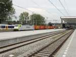 br-186-traxx-ms/265923/186-142-von-captrain-durchfaehrt-am-15082012 186-142 von Captrain durchfhrt am 15.08.2012 den Bahnhof Rotterdam Centraal.