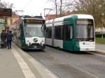 Die Wagen 411 (links) und 426 am 12.04.2012 in Potsdam.
Wagen 411: Linie 91 -> Bahnhof Pirschheide
Wagen 426: Linie 94 -> Babelsberg
