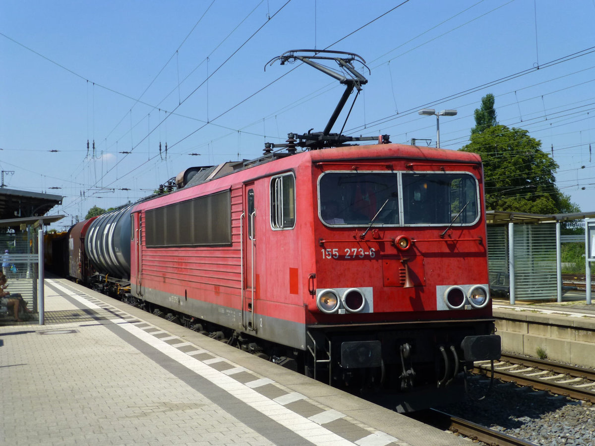 155 273 mit einem gemischten Güterzug bei der Durchfahrt in Unna, 24. Juli 2018.