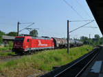 Weit weg vom Rhein ist Lok 2053 von Rheincargo am 29.5.18. Sie steht auf dem Bild auf einem Nebengleis in Weißenfels an der Saale, ums sich von schnelleren Zügen überholen zu lassen.