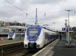 Zwei National Express Talente in Oberbarmen: 355 als RE7 nach Rheine und RB48 nach Kln mit 442 368 im Hintergrund auf Gleis 1, 23.12.15