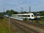 wuppertal-sonnborn/531736/ueber-dem-autobahnkreuz-sonnborn-treffen-sich ber dem Autobahnkreuz Sonnborn treffen sich am 2.9.16 der eurobahn-Flirt 7.12 nach Venlo und zwei NatEx-Talente (vorne Nr. 154) nach Rheine.