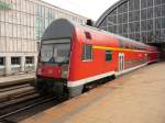 Eine DOSTO-Garnitur ist am 11.04.2012 als RE1 in Richtung Berlin-Charlottenburg unterwegs.