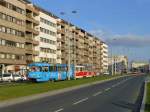 Zwei T3 der DPP auf der Linie 1 nach Sídliště Petřini am Letnapark bei Sparta. Im Hintergrund steht eine T15 an der Ampel.